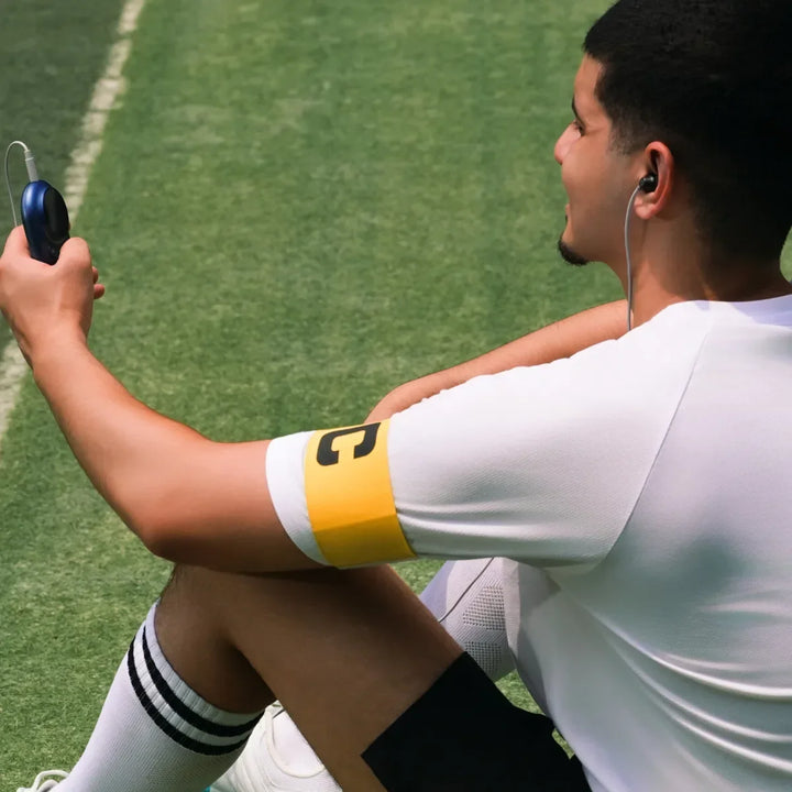 Man using a wearable health device as part of a personalized biohacking routine